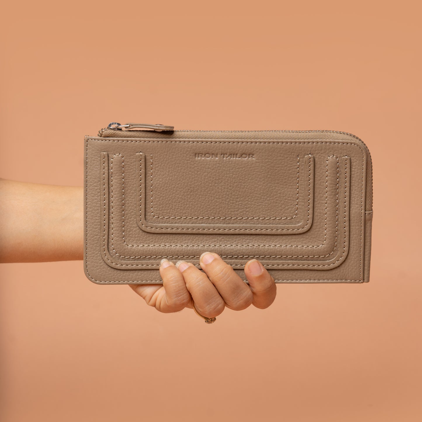 Beige Leather Women's Wallet in Hand | Iron Tailor