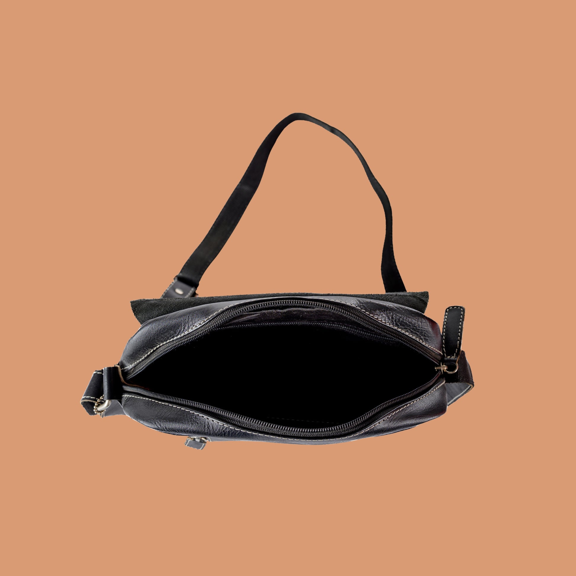 Black Leather Sling Bag with Spacious Interior Compartment | Iron Tailor