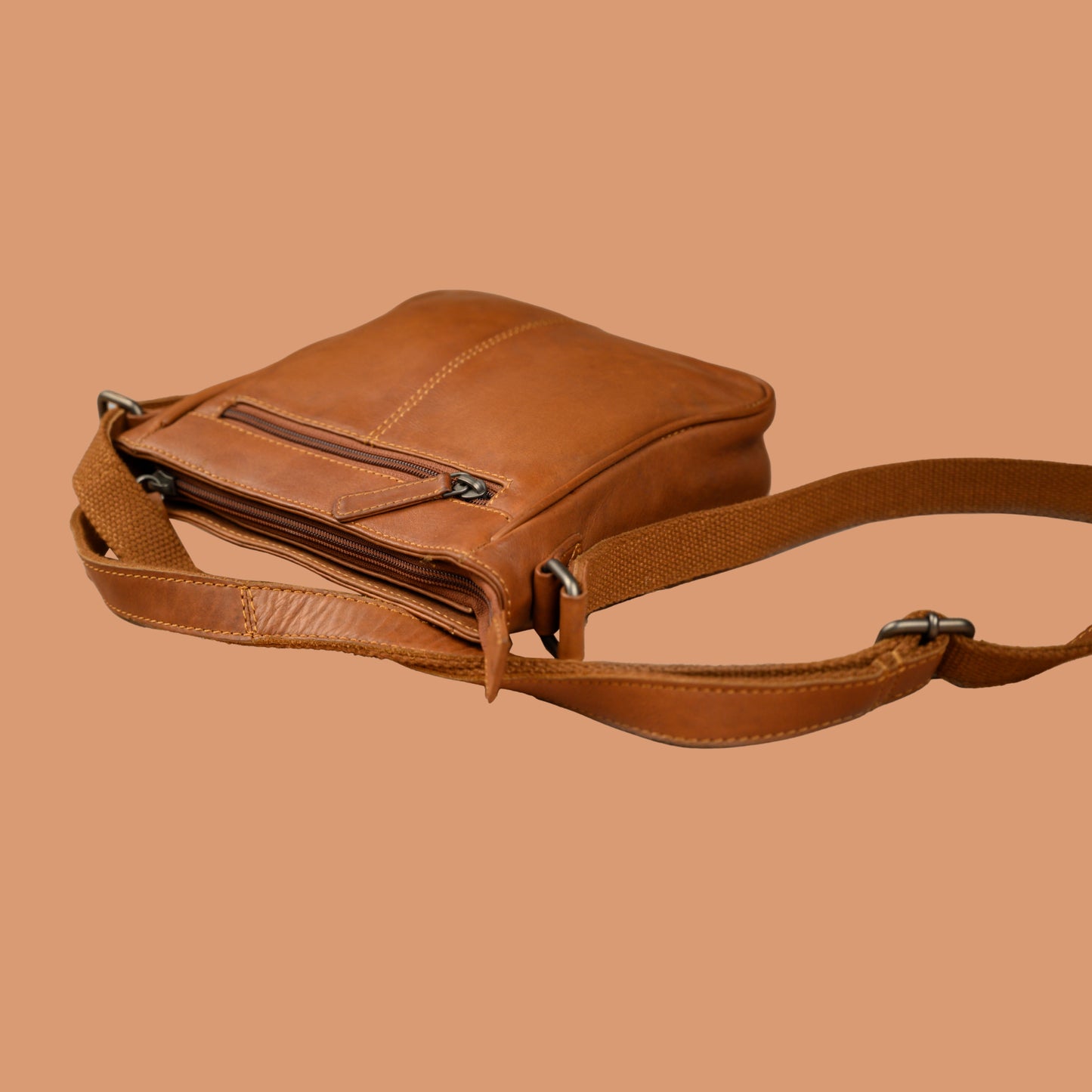 Side View of Brown Leather Sling Bag with Adjustable Strap | Iron Tailor