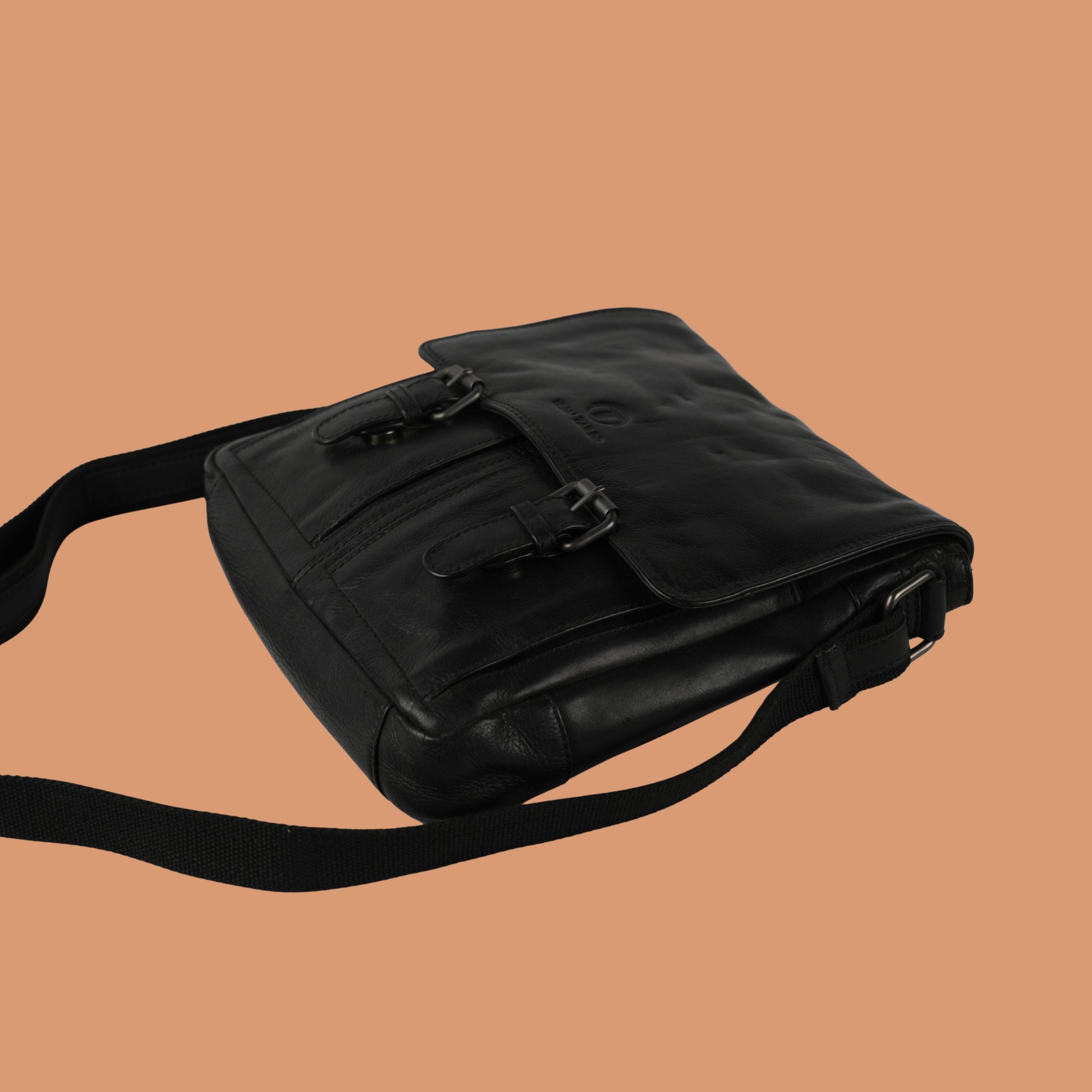 Front View of Black Leather Sling Bag with Adjustable Shoulder Strap | Iron Tailor
