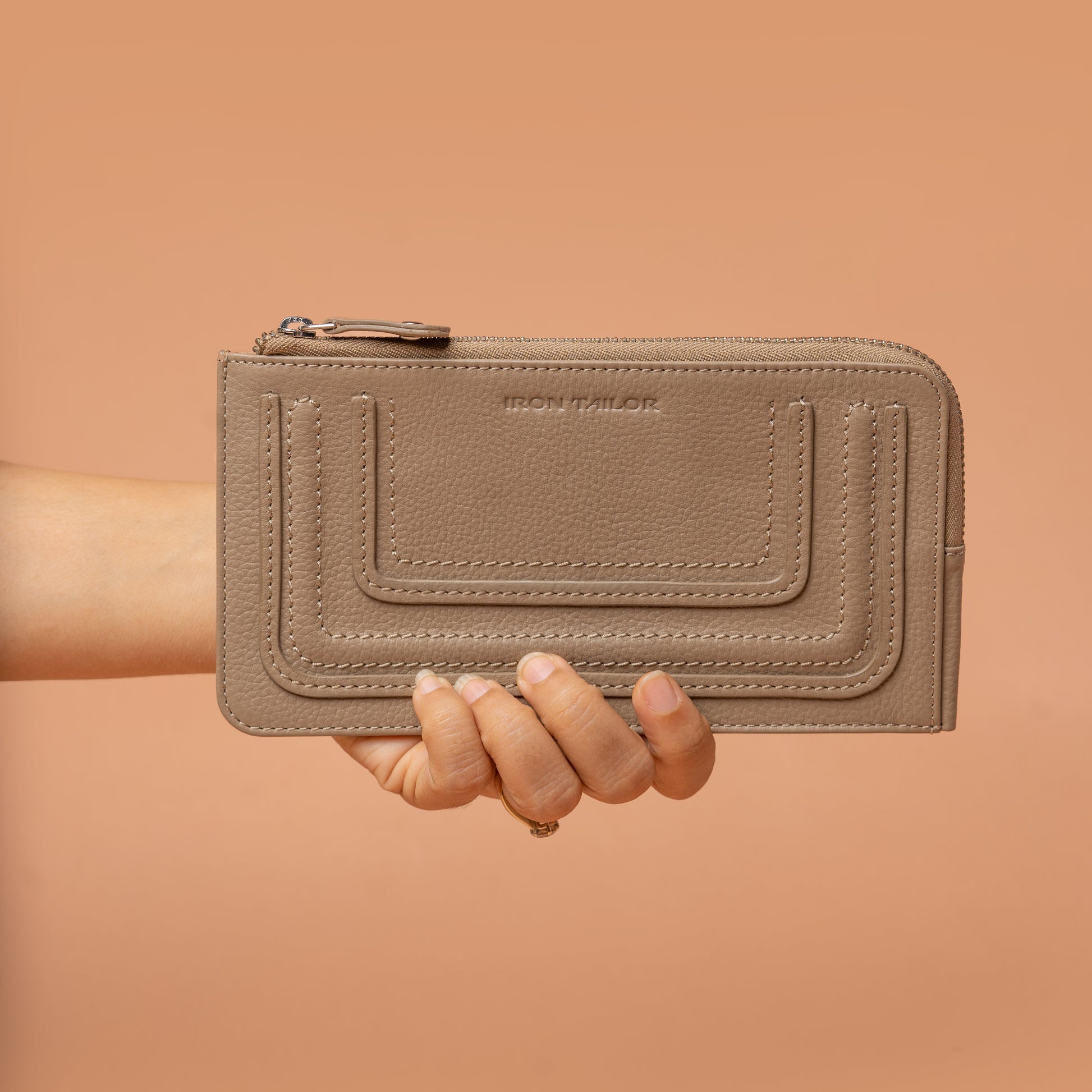 Beige Leather Women's Wallet in Hand | Iron Tailor