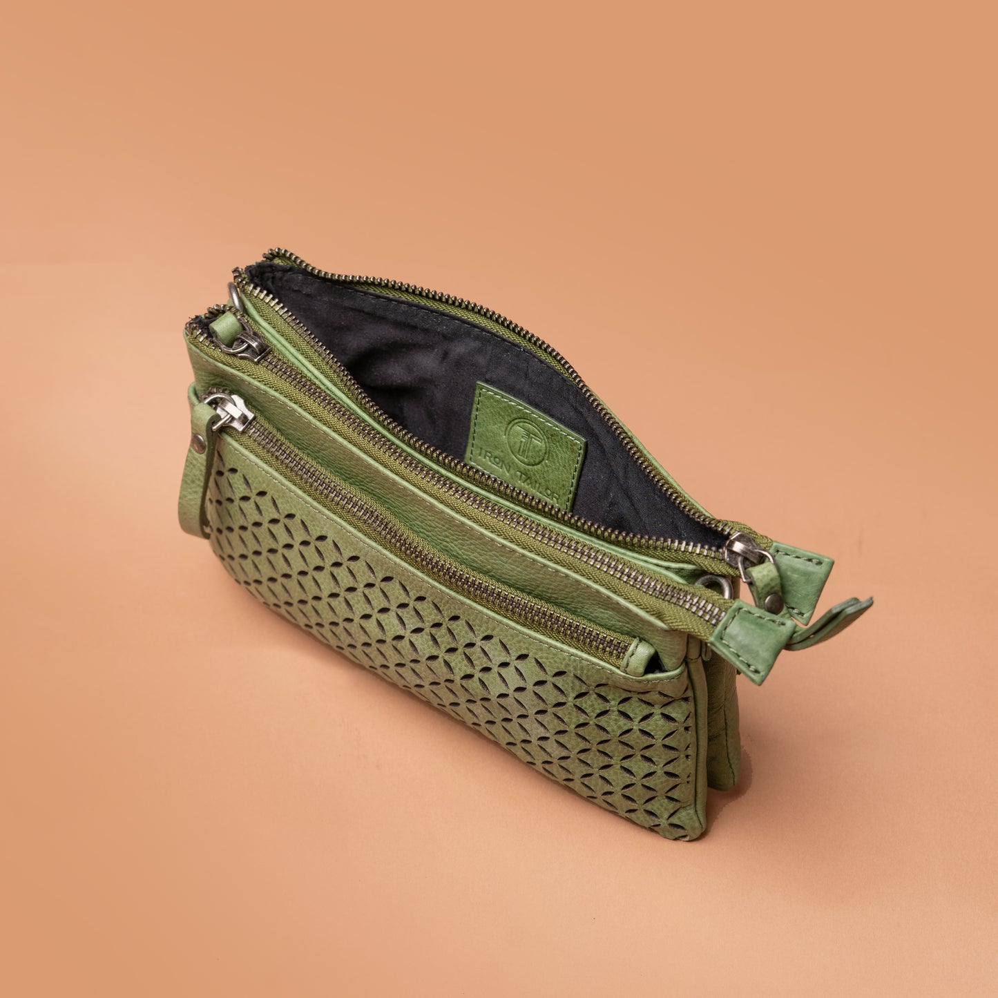 Green Leather Sling Bag with Spacious Interior | Iron Tailor