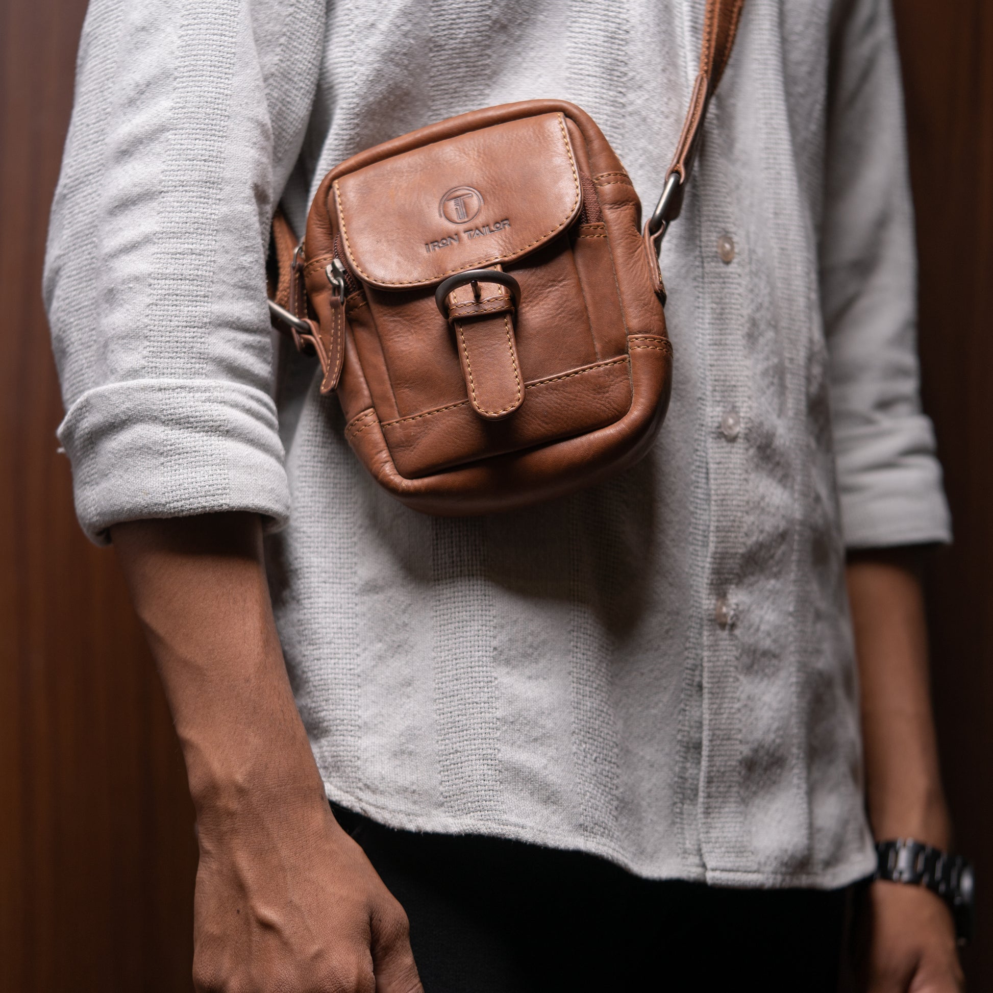 Tan Genuine Leather Nighter Sling Bag Lifestyle View | Iron Tailor